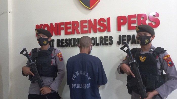 Tersangka-J.jpg