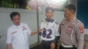 Polisi-mengamankan-pelaku-pemalakan-terhadap-sopir-truk-yang-membua.jpg