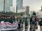 Aksi-unjuk-rasa-Indonesia-Gelap-di-Patung-Kuda.jpg