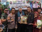 Camat-Bojonggede-Tenny-Ramdhani-saat-foto-di-st.jpg