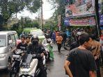 Lokasi-hanyutnya-pengendara-motor-di-Jalan-Dadali.jpg
