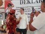 Menandatangani-Baju.jpg