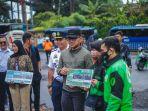 Ojol-dan-Sopir-Angkot-di-Kota-Bogor-Dapat-Bansos-BBM-Totalnya-Rp-14-Miliar.jpg