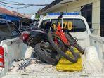 Penampakan-sepeda-motor-usai-ditabrak-angkot-di-Jalan-Ahmad-Yani.jpg