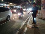 Seorang-perempuan-bajak-mobil-polisi-di-Tol.jpg