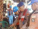 Tangkapan-layar-polisi-saat-ebakuasi-jasad-pekerja-pltu.jpg