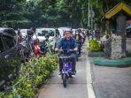 Transportasi-Ramah-Lingkungan-Bima-Arya-Kendarai-Sepeda-Listrik-di-Jalur-Sepeda.jpg