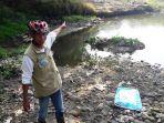 anggota-satgas-naturalisasi-sungai-ciliwung-suparno-jumar.jpg