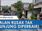 jalan-rusak-tak-kunjung-diperbaiki.jpg