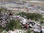 kubur-diri-di-tumpukan-sampah.jpg