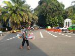 lalu-lintas-sekitaran-tugu-kujang-kota-bogor-selasa-162021.jpg