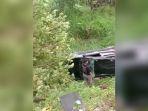 mobil-terguling-di-wilayah-Desa-Sukajaya.jpg
