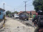 perbaikan-jalan-di-wilayah-jalan-raya-cigudeg-menuju-jalan-raya-jasinga-kabupaten-bogor.jpg