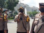 polres-metro-jakarta-pusat-mengimbau-massa-aksi-1812.jpg