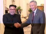 presiden-korea-utara-kim-jong-un-dan-pm-singapura-lee-hsien-loong_20180611_115737.jpg