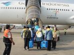 sejumlah-393-jemaah-haji-kloter-pertama-diberangkatkan-di-terminal-2-bandara-soekarno-hatta_20180717_134420.jpg