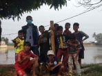 sejumlah-anak-anak-bermain-lodong.jpg