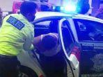 seorang-pria-berinisial-ab-41-diamankan-polisi-karena-berupaya-mencuri-mobil-pickup.jpg