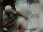 tangkapan-layar-video-viral-jenazah-pasien-covid-19-di-probolinggo-mengalami-pendarahan.jpg
