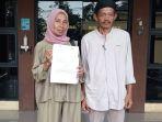 Entin-Suhetin-laporkan-kades-ke-polisi-subang.jpg