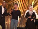 Golden-Buzzer-Putri-Ariani-Tuai-Polemik-Simon-Cowell-Didesak-Mundur-dari-AGT.jpg