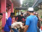 Jenazah-korban-bernama-Omos.jpg