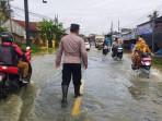 Kondisi-banjir-di-Ruas-Jalan-Raya-Nasional-KalipucanS.jpg