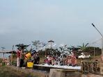 Mandi-Busa-Side-Landd.jpg