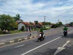 mudik-pakai-jaket-driver-ojol-agar-lolos-di-check-point-pemudik-lintasi-pantura-indramayu.jpg