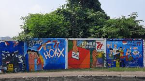 Mural-dengan-pesan-politik-menghiasi-tembok-sebelah-kiri-Traffic-Light-Juanda-Margonda-Depok.jpg