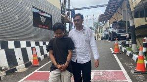 Pelaku-KDRT-berinisial-LR-digiring-di-Mapolres-Metro-Depok.jpg