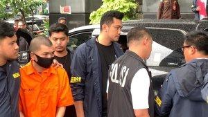 Yudha-Arfandi-saat-rekonstruksi-yang-digelar-di-Polda-Metro-Jaya-Jakarta-Selatan.jpg