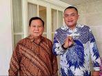 Calon-Bupati-Bogor-Rudy-Susmanto-kanan-berfoto-dengan-simbol-Bogor-Istimewa.jpg