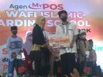 Direktur-Bisnis-Kurir-dan-Logistik-PT-Pos-Indonesia-Siti-Choiriana.jpg