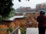 Jalan-penghubung-antara-Kabupaten-bogor-dengan-Kabupaten-Tangerang-longsor.jpg