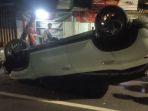 Mobil-Larasati-Terbalik.jpg