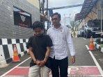 Pelaku-KDRT-berinisial-LR-digiring-di-Mapolres-Metro-Depok-Senin-2112024.jpg