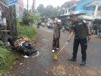 Polisi-melakukan-olah-tempat-kejadian-perkara-kasus-laka-lantas.jpg