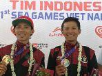 Zaenal-Fanani-dan-Ihza-Muhammad-peraih-Medali-Emas-dan-Perak-pada-Cabor-Sepeda-nomor-MTB.jpg