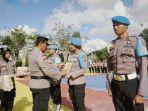 APEL-Kapolres-Mardiono-saat-menyilangkan-foto-seorang-personel.jpg