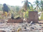 LUDES-Salah-satu-rumah-di-Desa-Bugaima-yang-hangus-dibakar-massa.jpg