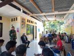 MEDIASI-Personel-TNI-dan-Polisi-saat-melakukan-mediasi.jpg