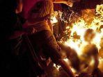 wanita-di-Kota-Sorong-Papua-Barat-Daya-dibakar-hidup-hidup-oleh-warga.jpg