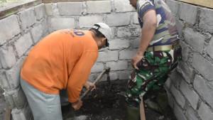 Satgas-TMMD-ke-126-Kodim-0119Bener-Meriah-membangun-fasilitas-MCK-di-Desa-Reje-Guru.jpg