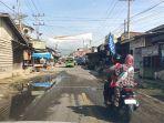 AIR-TERGENANG-DI-JALAN-NASIONALL.jpg