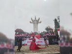 MERAH-PUTIH-DI-TUGU-RIMBA-RAYAA.jpg
