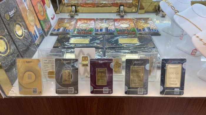 HARGA EMAS - Foto emas Galeri 24 diambil pada Jumat (13/3/2026) di Pegadaian Gorontalo. Harga emas di Pegadaian pada Jumat, 13 Maret 2026, untuk produk Galeri 24 dan UBS terpantau stabil dibandingkan dengan perdagangan sebelumnya.