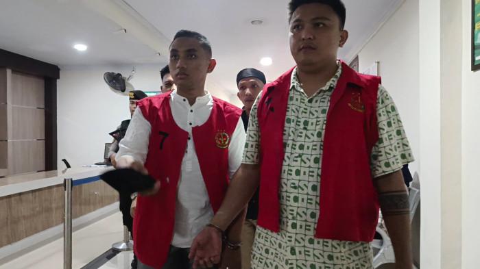 PENGADILAN -- Momen Amin Ramadhan digiring ke Pengadilan Gorontalo.