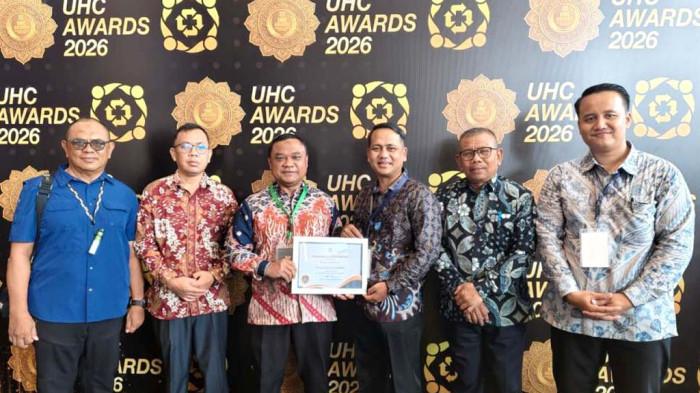 PENGHARGAAN -- Pemerintah Kabupaten Pohuwato kembali menorehkan prestasi di tingkat nasional dengan meraih penghargaan Universal Health Coverage (UHC) Awards 2026 sebagai pemerintah daerah kategori madya dalam pencapaian UHC.