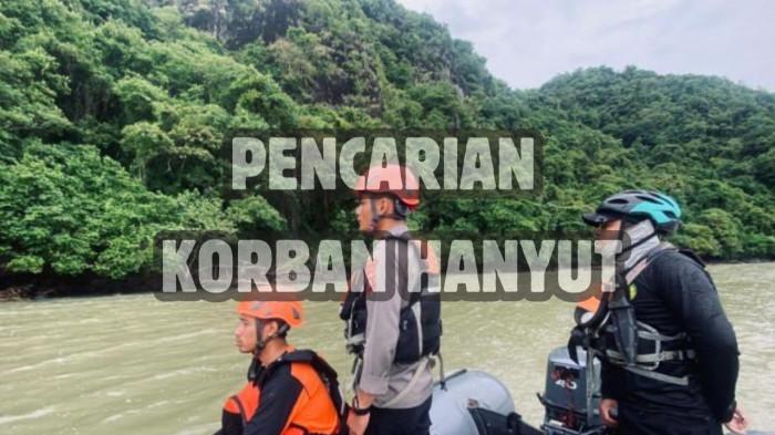 KORBAN HANYUT -- Potret Tim SAR Gorontalo mencari korban hanyut. Pencarian korban hanyut ibu dan anak di Sungai Paguyaman, Desa Motoduto, Kecamatan Boliyohuto, Kabupaten Gorontalo, Provinsi Gorontalo, diperluas hingga tengah laut.